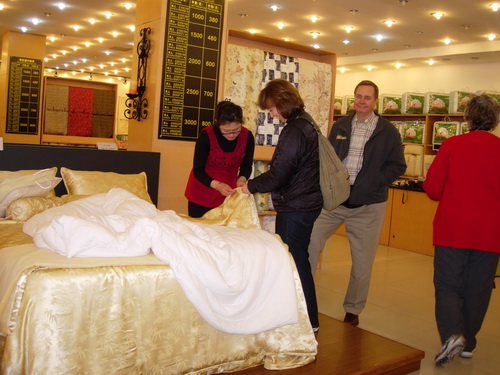 Jim and Janis buying a silk comforter – China 2010